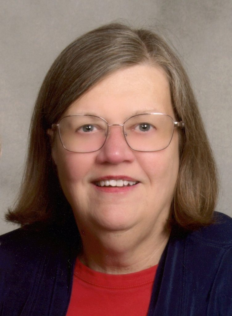 Brennan Caron headshot Caron Primas Brennan